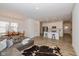 Open-concept living space with kitchen island, dining area, and inviting living room at 794 Harley Ln, Westfield, IN 46074