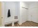 Mud room with bench, hooks, and a convenient storage closet for organizing at 794 Harley Ln, Westfield, IN 46074