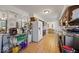 Spacious kitchen with brown cabinets, white appliances and room for storage at 8244 E Hadley Rd, Camby, IN 46113