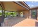 Covered porch with seating and a brick exterior at 8244 E Hadley Rd, Camby, IN 46113