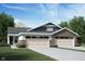 Charming single-story home with a two-car garage and inviting curb appeal at 882 Rosebud Ln, Greenfield, IN 46140