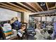 Unfinished basement featuring exposed ceiling beams, stored items and clutter, offering potential for customization and storage at 916 Settlers Walk, Brownsburg, IN 46112