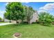 Lush front yard with mature trees and landscaping adds to the curb appeal of this home at 916 Settlers Walk, Brownsburg, IN 46112