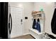 Mudroom with coat rack and shoe storage near entryway for convenient organization at 916 Settlers Walk, Brownsburg, IN 46112