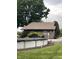 Spacious backyard with above-ground pool and a patio ideal for outdoor gatherings at 9467 N Michigan Rd, Fairland, IN 46126