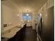 Modern kitchen with stainless steel appliances, white cabinets, and granite countertops at 9467 N Michigan Rd, Fairland, IN 46126
