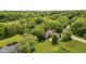Bird's eye view of the sprawling property with lush greenery and meticulously maintained landscaping at 9601 Irishmans Run Ln, Zionsville, IN 46077