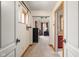 Hallway with neutral carpet and trim leads to main bedroom and bathroom at 9601 Irishmans Run Ln, Zionsville, IN 46077