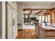 The kitchen flows to the living room with a fireplace, creating a cohesive living space in the home at 9601 Irishmans Run Ln, Zionsville, IN 46077