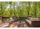 Cozy outdoor patio area with comfortable seating and scenic views of lush greenery at 9601 Irishmans Run Ln, Zionsville, IN 46077
