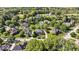 Spacious homes nestled in a lush, green neighborhood with mature trees and well-manicured lawns at 9973 Woods Edge Dr, Fishers, IN 46037
