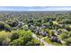 Scenic aerial view of a serene neighborhood filled with lush greenery and well-maintained homes at 9973 Woods Edge Dr, Fishers, IN 46037
