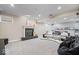 Finished basement featuring a fireplace, a home theatre, and ample seating at 9973 Woods Edge Dr, Fishers, IN 46037