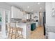 Open kitchen with island, granite countertops, and stainless steel appliances at 9973 Woods Edge Dr, Fishers, IN 46037