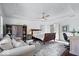 Spacious main bedroom with sitting area, desk space, and natural light at 9973 Woods Edge Dr, Fishers, IN 46037
