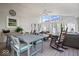 Relaxing covered patio with dining set and lounge area at 9973 Woods Edge Dr, Fishers, IN 46037