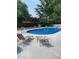 Relaxing pool area features in-ground pool and lounge chairs for backyard enjoyment at 101 E Hill Valley E Dr, Indianapolis, IN 46227