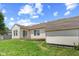 Backyard featuring a shed and wooden deck at 10693 Newgate Ln, Indianapolis, IN 46231
