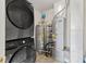Utility room featuring washer, dryer, water heater, and furnace at 10693 Newgate Ln, Indianapolis, IN 46231