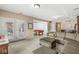 Spacious finished basement area with pool table, wet bar, and ample seating for entertaining guests at 11244 Blackwalnut Pt, Indianapolis, IN 46236
