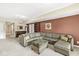 Comfortable finished basement with plush seating, home theater, and a cozy atmosphere for relaxation at 11244 Blackwalnut Pt, Indianapolis, IN 46236