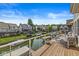 Beautiful lake view from the spacious deck with seating and waterfront access at 11244 Blackwalnut Pt, Indianapolis, IN 46236