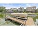 Boat dock featuring a covered boat lift, providing easy access to the open water at 11244 Blackwalnut Pt, Indianapolis, IN 46236