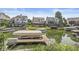 Waterfront property showcasing boat docks with lifts, providing direct access to the lake at 11244 Blackwalnut Pt, Indianapolis, IN 46236