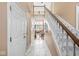 Bright foyer with marble tile, staircase, and view into the living room, creating an inviting entry at 11244 Blackwalnut Pt, Indianapolis, IN 46236