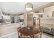 Open floor plan featuring kitchen, dining space, living room and fireplace at 11244 Blackwalnut Pt, Indianapolis, IN 46236