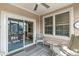 Inviting screened porch with cozy chairs and glimpses of the exterior, perfect for outdoor living at 11244 Blackwalnut Pt, Indianapolis, IN 46236