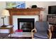 Inviting living room with a fireplace and wooden mantel at 1129 Nantucket Dr, Cicero, IN 46034