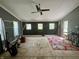 Bright living room featuring unfinished floors and a modern ceiling fan at 1129 Nantucket Dr, Cicero, IN 46034