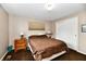 Comfortable bedroom with a large window, blinds, and closet at 121 Mulberry Dr, Chesterfield, IN 46017