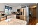Contemporary kitchen with stainless steel appliances and bright natural light at 121 Mulberry Dr, Chesterfield, IN 46017
