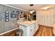 Kitchen featuring stone countertops, an island, and abundant storage at 121 Mulberry Dr, Chesterfield, IN 46017