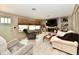 Bright living room with stone fireplace, tv, and natural light at 121 Mulberry Dr, Chesterfield, IN 46017