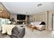 Cozy living room with a fireplace, built-in shelves, and ample seating at 121 Mulberry Dr, Chesterfield, IN 46017