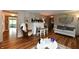 Bright living room with hardwood floors, fireplace, and comfortable seating at 121 Mulberry Dr, Chesterfield, IN 46017