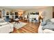 Inviting living room with fireplace, neutral colors, hardwood floors, and stylish furnishings at 121 Mulberry Dr, Chesterfield, IN 46017