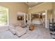 Spacious living room featuring a vaulted ceiling and comfortable seating at 12772 Tram Ln, Carmel, IN 46032