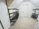 Walk-in closet features white walls, carpeted floor and open shelving system for optimal organization at 12772 Tram Ln, Carmel, IN 46032