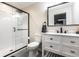 Modern bathroom featuring a glass shower and a vanity with stylish fixtures at 14149 Ledgewood Way, Carmel, IN 46032