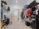 Well-organized walk-in closet with shelving, hanging racks, and access to other areas of the home at 14848 Stonneger St, Westfield, IN 46074