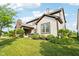 Spacious backyard with lush landscaping and exterior view of the home's patio at 1521 Avondale Dr, Westfield, IN 46074