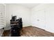 This room has laminate wood floor, a closet, and a computer gaming setup at 1521 Avondale Dr, Westfield, IN 46074