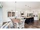 Open concept kitchen and dining area with a dining table, a hutch, and modern appliances at 1521 Avondale Dr, Westfield, IN 46074
