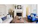 Cozy living room featuring a fireplace, wooden accents, and comfortable seating at 1521 Avondale Dr, Westfield, IN 46074