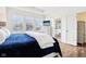 Bright main bedroom features plantation shutters, wood floors, ensuite bathroom with soaking tub at 1521 Avondale Dr, Westfield, IN 46074