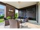 Inviting outdoor patio featuring a brick fireplace and comfortable seating area at 1521 Avondale Dr, Westfield, IN 46074